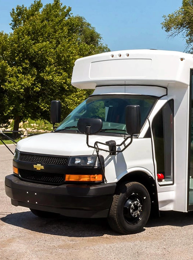 white passenger activity bus